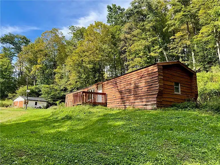 Wide on 1.42 Acres with Privacy and Updates Throughout