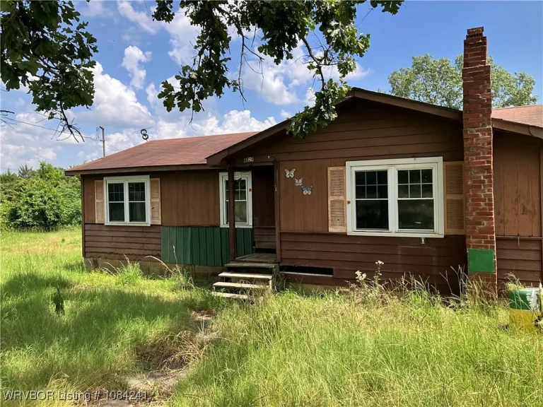 Charming Country Cottage with Big Potential on 1+ Acre