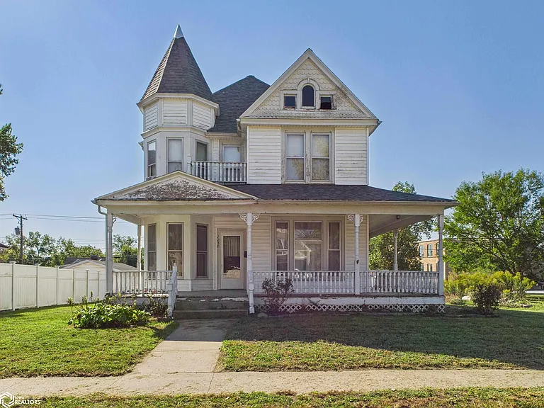 Step into timeless elegance with this Victorian-style home