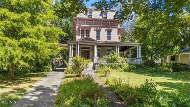 Majestic 1860 Brick Victorian Estate with Carriage Barn