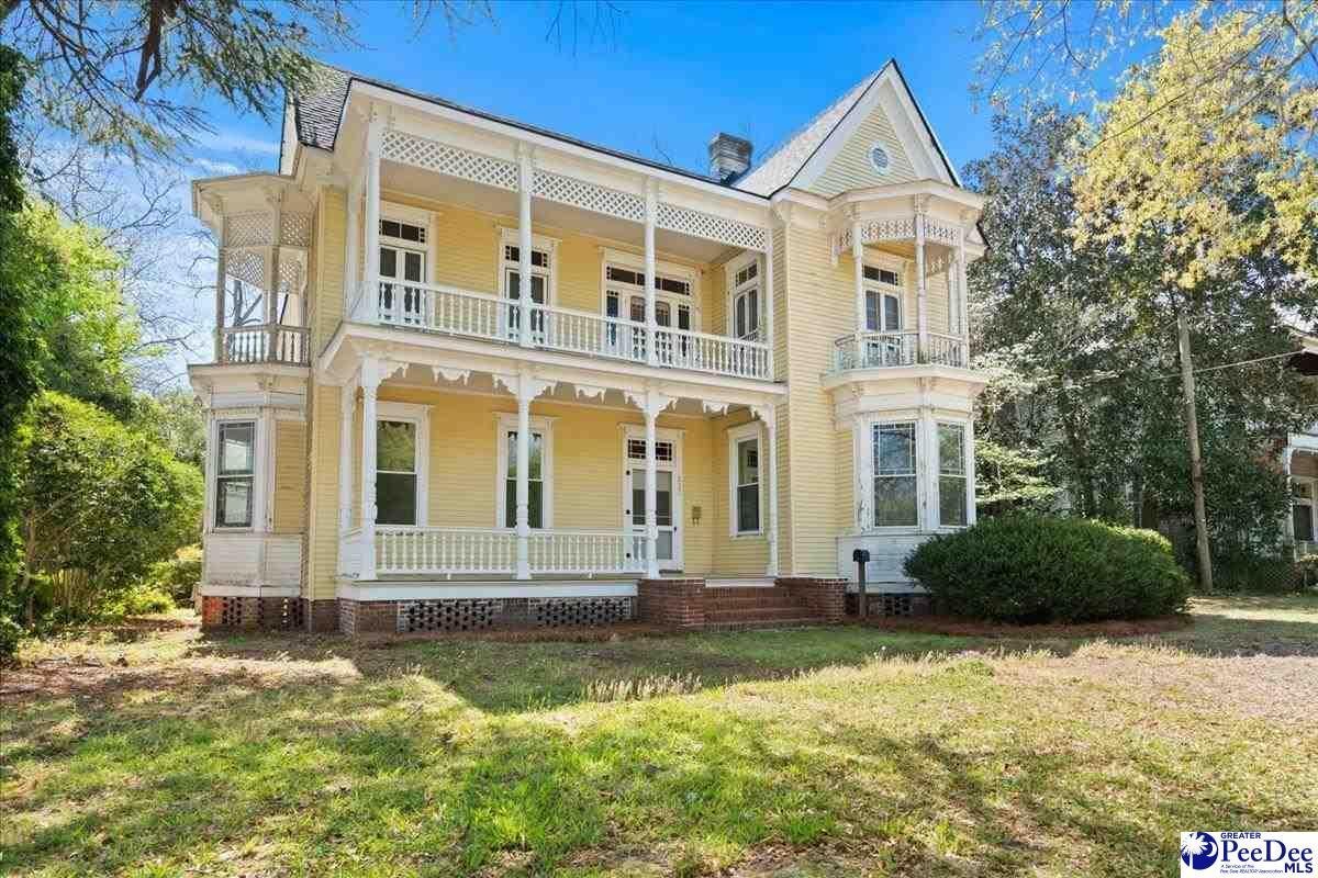 Monumental Queen Anne Grandeur: A 1890 Historic Icon on Nearly an Acre