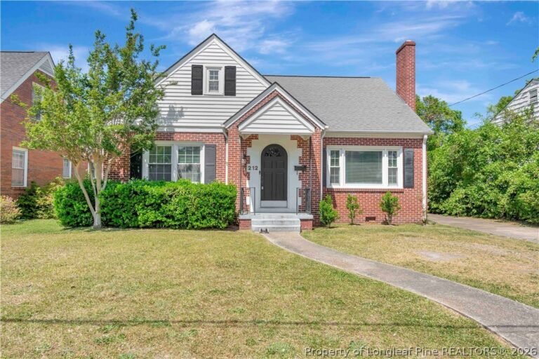 Charming 1950s Brick Cottage: Original Hardwoods & Modern Updates | $154,900