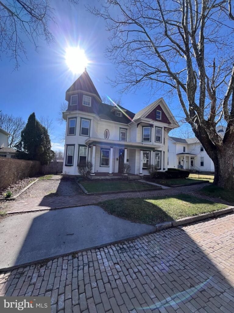 Own the Iconic Tower House: 1915 Victorian Beauty in Frostburg | $329,000