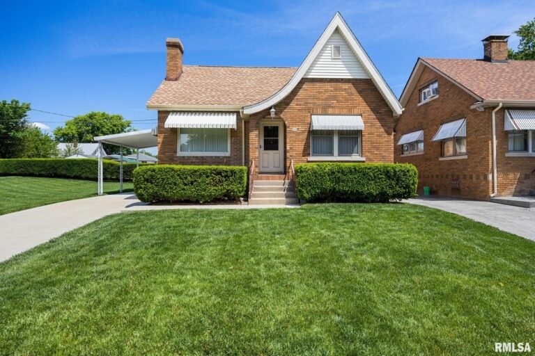 Historic Elegance: 1930 Brick Home with Original Arched Details | $112,000