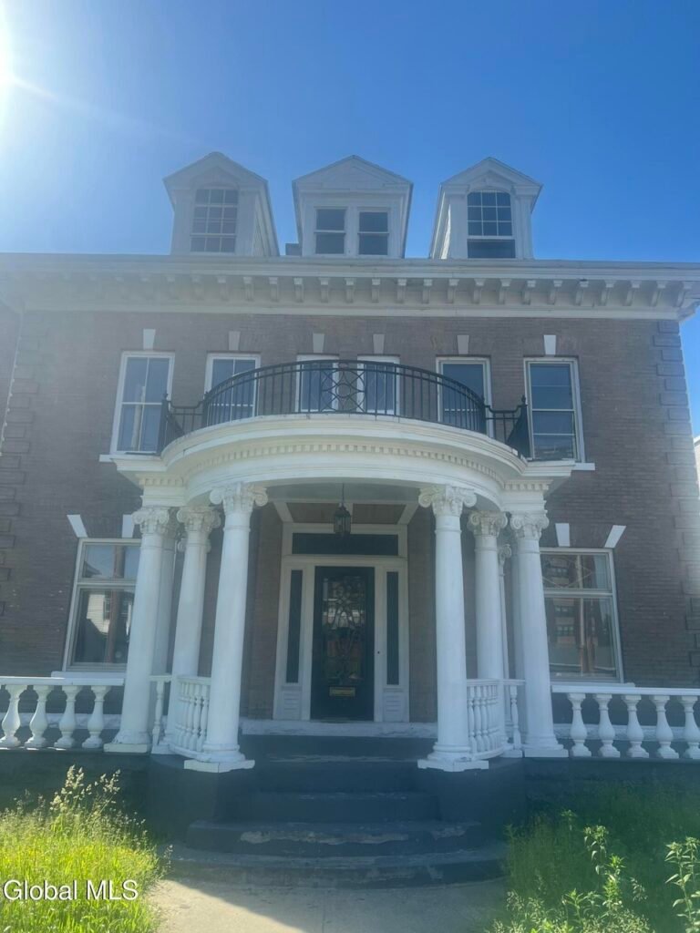 “Turnkey Historic Landmark: 3,600 Sq. Ft. Estate with Rare 3-Car Garage | $299,900”