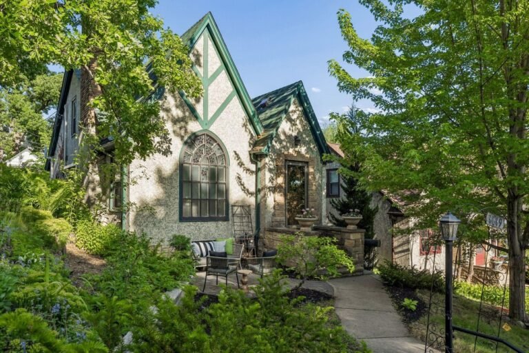 “The Storybook Tudor: 1931 Historic Landmark with Rare Winter-Proof Garage Access